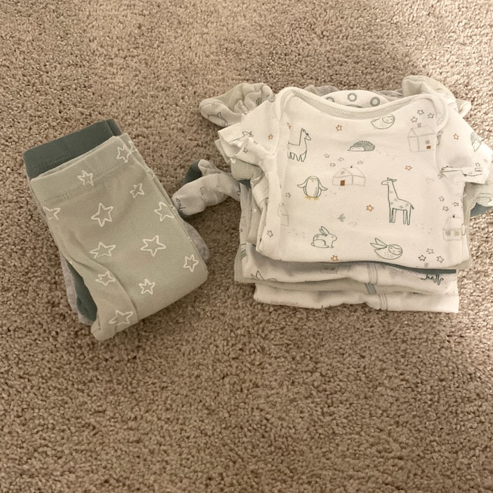 Bundle of newborn clothes